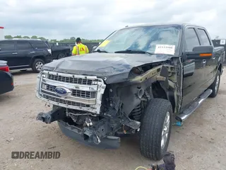 2014 Ford F-150 XL with VIN 1FTFW1CF4EKD00179, listed as a IAAI auction lot 42133580 with 100,826 mi miles and . Bid and sale history available at DreamBid. Image 2.