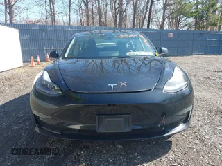 2023 Tesla Model 3 Long Range with VIN 5YJ3E1EB1PF392027, listed as a IAAI auction lot 41983638 with 31,415 mi miles and . Bid and sale history available at DreamBid. Image 11.
