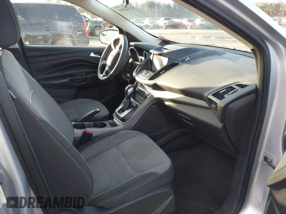 2014 Ford Escape SE with VIN 1FMCU9G96EUC53975, listed as a IAAI auction lot 41342661 with 128,594 mi miles. Bid and sale history available at carsss.com. Image 5.