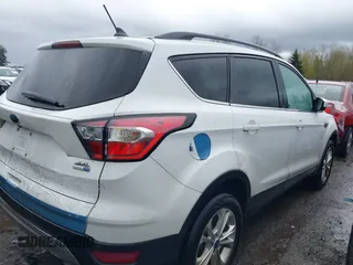 2018 Ford Escape SEL with VIN 1FMCU9HD5JUA42764, listed as a IAAI auction lot 41869026 with 84,958 mi miles. Bid and sale history available at carsss.com. Image 4.