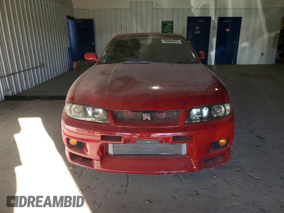 1997 Nissan Skyline z VIN BCNR33042682, wystawiony jako Copart lot #76562674 z przebiegiem 61 791 mil mil oraz Czysty tytuł • Clean title. Historia ofert i sprzedaży dostępna na DreamBid. Obrazek 5.