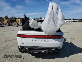 2024 Rivian R1T Adventure z VIN 7FCTGCAA9RN030318, wystawiony jako Copart lot #77036474 z przebiegiem 3 522 mil mil oraz Szkoda całkowita • Salvage title. Historia ofert i sprzedaży dostępna na DreamBid. Obrazek 6.