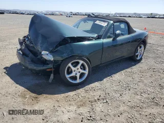 2000 Mazda MX-5 Miata z VIN JM1NB3536Y0147777, wystawiony jako Copart lot #57884375 z przebiegiem 140 874 mil mil oraz Szkoda całkowita • Salvage title. Historia ofert i sprzedaży dostępna na DreamBid. Obrazek 1.