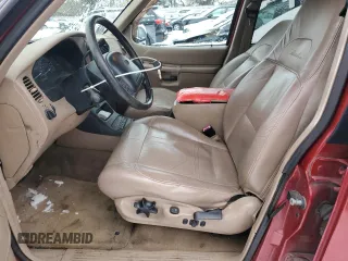 1999 Ford Explorer XLT with VIN 1FMDU34E7XZA60386, listed as a Copart auction lot 86851594 with 218,592 mi miles and Salvage title. Bid and sale history available at DreamBid. Image 7.