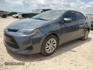 2019 Toyota Corolla L z VIN 5YFBURHE4KP944300, wystawiony jako Copart lot #55816195 z przebiegiem 56 951 mil mil oraz Szkoda całkowita • Salvage title. Historia ofert i sprzedaży dostępna na DreamBid. Obrazek 1.