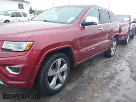 2014 Jeep Grand Cherokee Overland with VIN 1C4RJFCG9EC299235, listed as a IAAI auction lot 41670065 with 108,589 mi miles and . Bid and sale history available at DreamBid. Image 20.