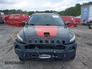 2015 Jeep Cherokee Trailhawk with VIN 1C4PJMBS5FW792184, listed as a IAAI auction lot 41827106 with 132,752 mi miles. Bid and sale history available at carsss.com. Image 12.