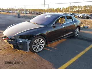 2013 Tesla Model S with VIN 5YJSA1CN7DFP22690, listed as a IAAI auction lot 40981089 with 188,057 mi miles. Bid and sale history available at carsss.com. Image 2.