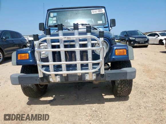 2000 Jeep Wrangler Sport with VIN 1J4FA49S9YP742414, listed as a Copart auction lot 61471065 with 139,572 mi miles and Clean title. Bid and sale history available at DreamBid. Image 5.