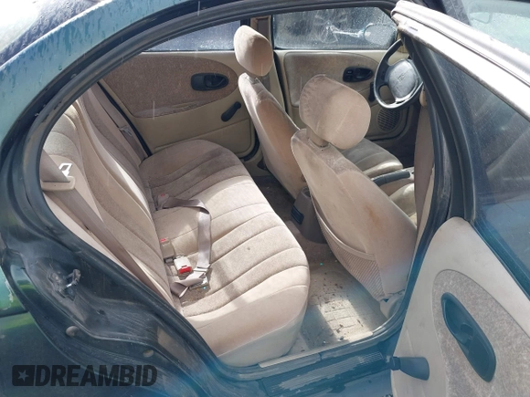 1997 Saturn SL with VIN 1G8ZK5276VZ329694, listed as a IAAI auction lot 41792109 with 208,002 mi miles and . Bid and sale history available at DreamBid. Image 8.