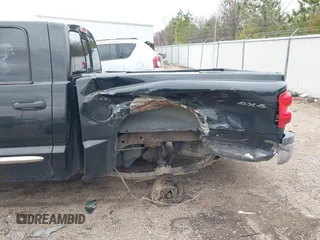 2008 Dodge Dakota Laramie with VIN 1D7HW58NX8S602604, listed as a IAAI auction lot 41717006 with 167,023 mi miles. Bid and sale history available at carsss.com. Image 6.