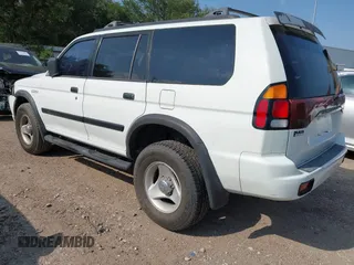 2000 Mitsubishi Montero LS z VIN JA4LS31H5YP804045, wystawiony jako IAAI lot #42415428 z przebiegiem 185 956 mil mil oraz . Historia ofert i sprzedaży dostępna na DreamBid. Obrazek 3.