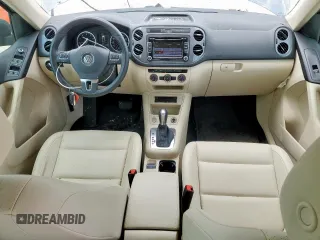 2014 Volkswagen Tiguan SEL с VIN WVGAV3AX7EW506170, выставлен на аукционе Copart как лот 58852355 с пробегом 55 961 миль миль и Списание • Salvage title. История ставок и продаж доступна на DreamBid. Изображение 8.