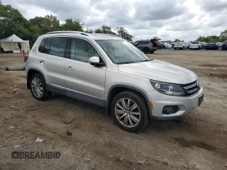 2013 Volkswagen Tiguan SE z VIN WVGBV7AX0DW539618, wystawiony jako Copart lot #71529804 z przebiegiem 148 362 mil mil oraz Szkoda całkowita • Salvage title. Historia ofert i sprzedaży dostępna na DreamBid. Obrazek 4.
