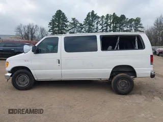 2003 Ford Econoline Passenger XL with VIN 1FBNE31L63HA12648, listed as a IAAI auction lot 41763111 with 592,494 mi miles and . Bid and sale history available at carsss.com. Image 15.