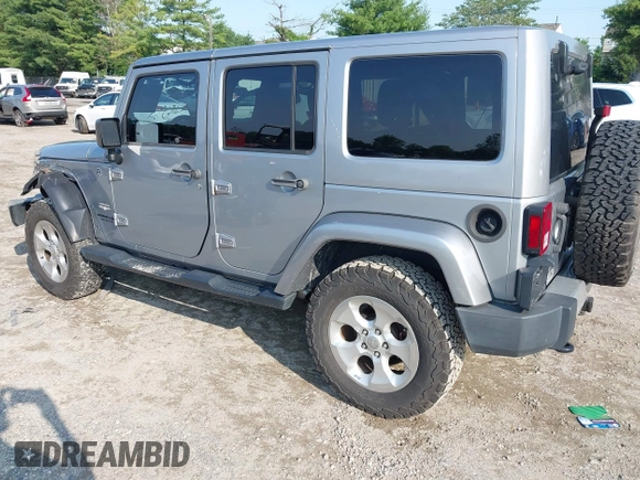 2015 Jeep Wrangler Unlimited Sahara with VIN 1C4BJWEG9FL570780, listed as a IAAI auction lot 42474940 with 116,226 mi miles and . Bid and sale history available at DreamBid. Image 3.