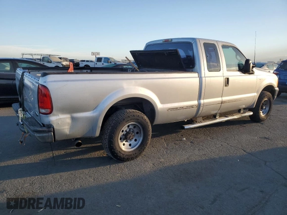 1999 Ford Super Duty F-250 XL with VIN 1FTNX20F3XED60894, listed as a Copart auction lot 74849284 with 148,779 mi miles and Salvage Title. Bid and sale history available at carsss.com. Image 3.