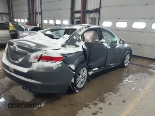 2009 Mazda 6 i Touring with VIN 1YVHP82A495M38694, listed as a IAAI auction lot 41577128 with 230,557 mi miles and . Bid and sale history available at carsss.com. Image 4.