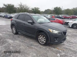 2015 Mazda CX-5 Touring with VIN JM3KE2CY4F0435563, listed as a IAAI auction lot 41311988 with 187,183 mi miles. Bid and sale history available at carsss.com. Image 1.