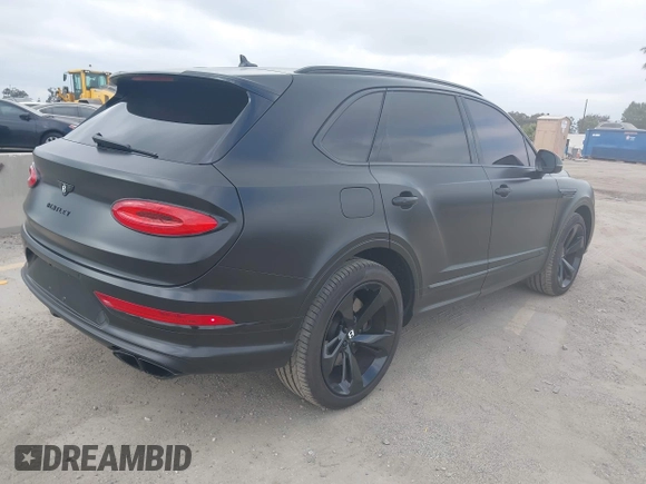 2021 Bentley Bentayga V8 z VIN SJAAM2ZV5MC038171, wystawiony jako IAAI lot #42057762 z przebiegiem 25 973 mil mil oraz . Historia ofert i sprzedaży dostępna na DreamBid. Obrazek 4.