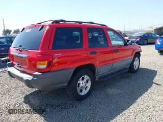 1999 Jeep Grand Cherokee Laredo with VIN 1J4GW58S5XC644757, listed as a IAAI auction lot 42139920 with 192,745 mi miles and . Bid and sale history available at DreamBid. Image 4.