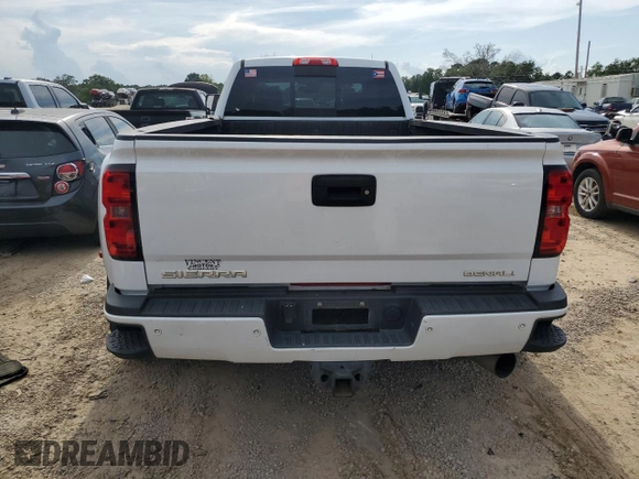 2016 GMC Sierra 3500HD Denali z VIN 1GT42YE84GF304755, wystawiony jako Copart lot #64882644 z przebiegiem 120 309 mil mil oraz Szkoda całkowita • Salvage title. Historia ofert i sprzedaży dostępna na DreamBid. Obrazek 6.