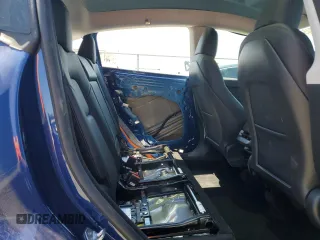 2024 Tesla Model Y z VIN 7SAYGDED9RF005104, wystawiony jako Copart lot #64974545 z przebiegiem 20 422 mil mil oraz Szkoda całkowita • Salvage title. Historia ofert i sprzedaży dostępna na DreamBid. Obrazek 10.