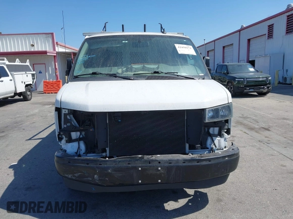 2023 Chevrolet Express Cargo with VIN 1GCWGAFP2P1100606, listed as a IAAI auction lot 42450171 with 34,000 mi miles and . Bid and sale history available at DreamBid. Image 6.