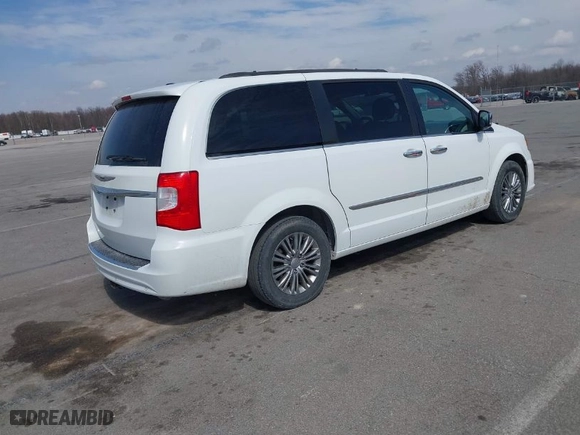 2015 Chrysler Town & Country Touring-L with VIN 2C4RC1CG8FR755148, listed as a IAAI auction lot 41806971 with 106,214 mi miles. Bid and sale history available at carsss.com. Image 4.