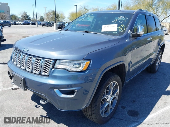 2019 Jeep Grand Cherokee Overland with VIN 1C4RJFCG6KC726690, listed as a IAAI auction lot 41421299 with 116,190 mi miles. Bid and sale history available at carsss.com. Image 2.