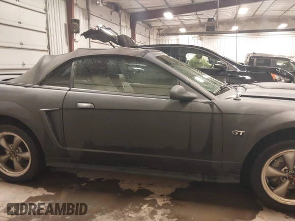 2002 Ford Mustang GT Deluxe z VIN 1FAFP45X92F176117, wystawiony jako IAAI lot #41619448 z przebiegiem 178 787 mil mil oraz . Historia ofert i sprzedaży dostępna na DreamBid. Obrazek 13.