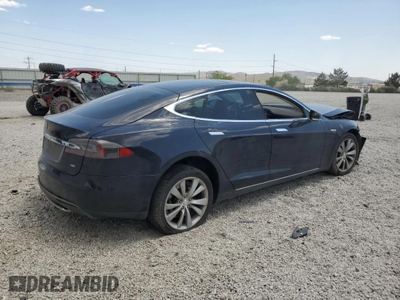 2014 Tesla Model S 60 with VIN 5YJSA1S12EFP29885, listed as a Copart auction lot 59769215 with Not provided miles and Salvage title. Bid and sale history available at DreamBid. Image 3.