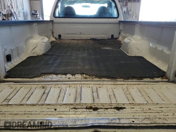 2005 Ford F-250 XL z VIN 1FTNF20545EB79620, wystawiony jako Copart lot #84940344 z przebiegiem 209 677 mil mil oraz Szkoda całkowita • Salvage title. Historia ofert i sprzedaży dostępna na DreamBid. Obrazek 10.