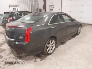 2014 Cadillac ATS Standard AWD z VIN 1G6AG5RX8E0174762, wystawiony jako IAAI lot #42323296 z przebiegiem 107 213 mil mil oraz . Historia ofert i sprzedaży dostępna na DreamBid. Obrazek 4.