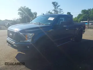 2018 Ford F-150 XL with VIN 1FTFX1EG0JFB07498, listed as a IAAI auction lot 42550647 with 126,637 mi miles and . Bid and sale history available at DreamBid. Image 16.