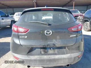 2018 Mazda CX-3 Touring with VIN JM1DKDC70J0325325, listed as a IAAI auction lot 40914334 with 63,978 mi miles. Bid and sale history available at carsss.com. Image 16.