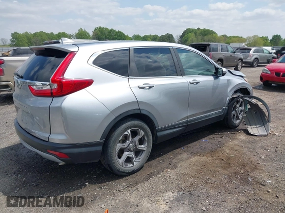 2017 Honda CR-V EX with VIN 7FARW1H53HE031126, listed as a IAAI auction lot 42018103 with 75,312 mi miles. Bid and sale history available at carsss.com. Image 4.
