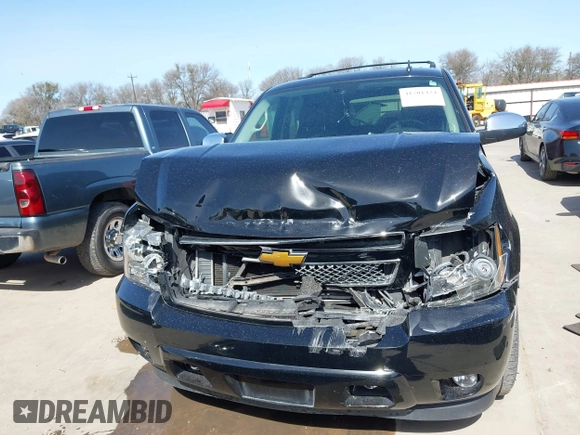 2009 Chevrolet Tahoe LTZ z VIN 1GNFC33J69R285570, wystawiony jako IAAI lot #41701424 z przebiegiem 165 811 mil mil oraz . Historia ofert i sprzedaży dostępna na DreamBid. Obrazek 12.
