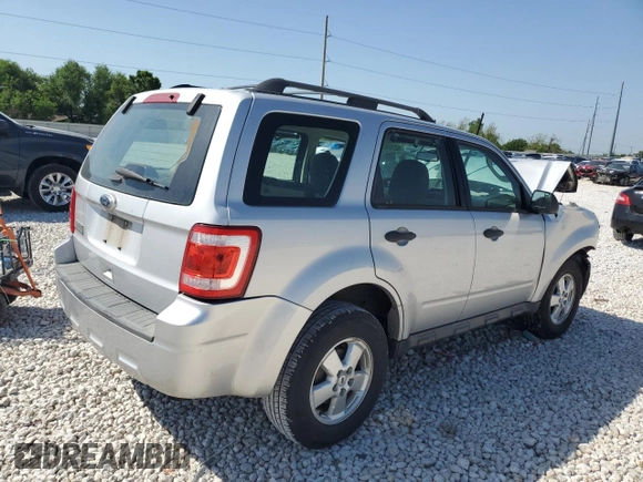 2011 Ford Escape XLS с VIN 1FMCU0C70BKB97667, выставлен на аукционе Copart как лот 52709365 с пробегом 140 582 миль миль и Списание • Salvage title. История ставок и продаж доступна на DreamBid. Изображение 3.