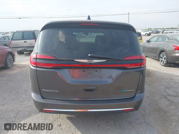 2023 Chrysler Pacifica Hybrid Touring L z VIN 2C4RC1L73PR598923, wystawiony jako IAAI lot #42124867 z przebiegiem 51 173 mil mil oraz . Historia ofert i sprzedaży dostępna na DreamBid. Obrazek 16.