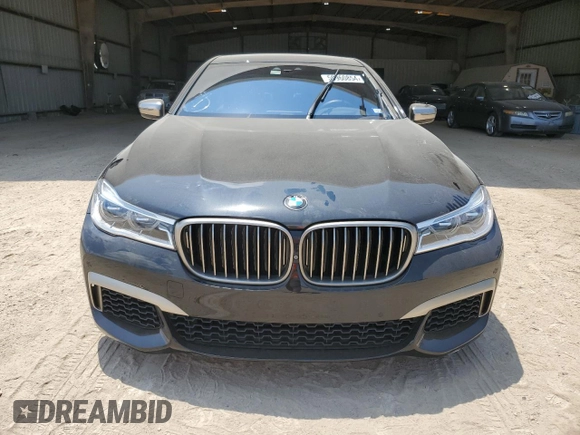 2019 BMW 7 Series M760i xDrive with VIN WBA7H6C50KG615270, listed as a Copart auction lot 59960854 with 42,172 mi miles and Salvage title. Bid and sale history available at DreamBid. Image 5.