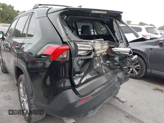 2022 Toyota RAV4 XLE Premium with VIN JTMC1RFV0ND085813, listed as a IAAI auction lot 42152401 with 86,707 mi miles and . Bid and sale history available at DreamBid. Image 6.
