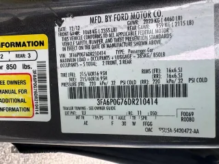 2013 Ford Fusion S z VIN 3FA6P0G76DR210414, wystawiony jako Copart lot #59056175 z przebiegiem 195 306 mil mil oraz Tytuł czysty. Historia ofert i sprzedaży dostępna na DreamBid. Obrazek 10.