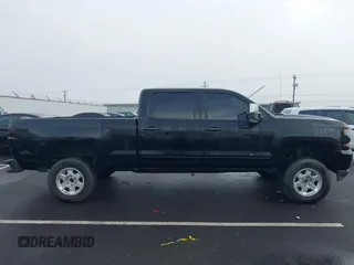 2017 Chevrolet Silverado 1500 LT with VIN 1GCUKREC1HF117744, listed as a IAAI auction lot 41091255 with 61,984 mi miles and . Bid and sale history available at DreamBid. Image 13.