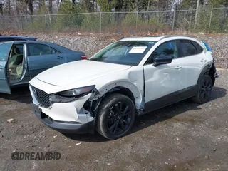 2022 Mazda CX-30 2.5 Turbo with VIN 3MVDMBAY7NM443187, listed as a IAAI auction lot 41771395 with 39,475 mi miles and . Bid and sale history available at DreamBid. Image 17.