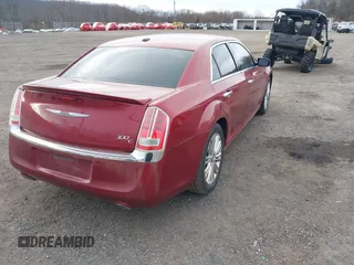 2012 Chrysler 300 C with VIN 2C3CCAKT4CH217217, listed as a IAAI auction lot 41502473 with 193,258 mi miles and . Bid and sale history available at DreamBid. Image 4.