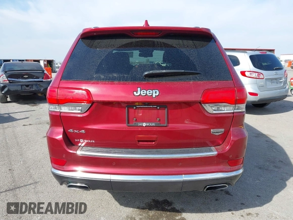 2014 Jeep Grand Cherokee Summit with VIN 1C4RJFJG6EC328516, listed as a IAAI auction lot 40698068 with 195,798 mi miles and . Bid and sale history available at DreamBid. Image 16.