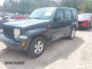 2011 Jeep Liberty Sport 70th Anniversary with VIN 1J4PN2GK6BW595515, listed as a IAAI auction lot 42123728 with 313,980 mi miles and . Bid and sale history available at DreamBid. Image 2.
