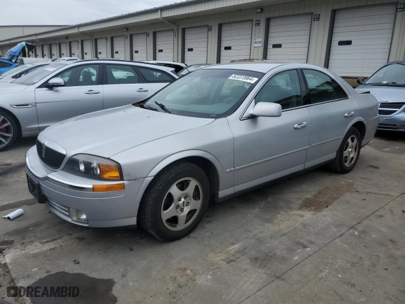2000 Lincoln LS with VIN 1LNHM86SXYY773355, listed as a Copart auction lot 82223964 with 0 mi miles and Salvage Title. Bid and sale history available at carsss.com. Image 1.