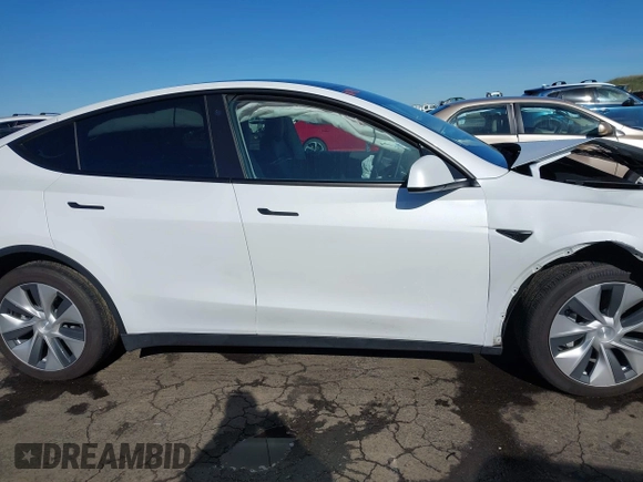 2022 Tesla Model Y Long Range with VIN 7SAYGDEE1NF402745, listed as a IAAI auction lot 41493850 with 11,222 mi miles and . Bid and sale history available at DreamBid. Image 13.